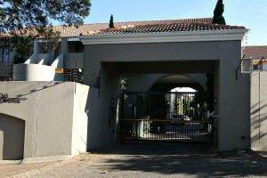 The entrance gate to the Sandton Gateway self-catering apartment in Craighall Park, Johannesburg.