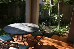 The small ground-floor garden at the Sandton Gateway self-catering apartment in Craighall Park, Johannesburg.