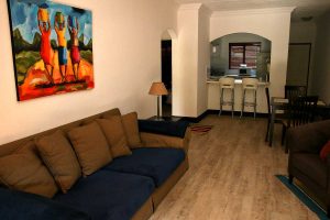 The lounge at the Sandton Gateway self-catering apartment in Craighall Park, Johannesburg.