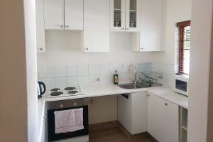 The kitchen in the Sandton Gateway self-catering apartment in Craighall Park, Johannesburg.