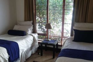 The second bedroom in the Sandton Gateway self-catering apartment in Craighall Park, Johannesburg.